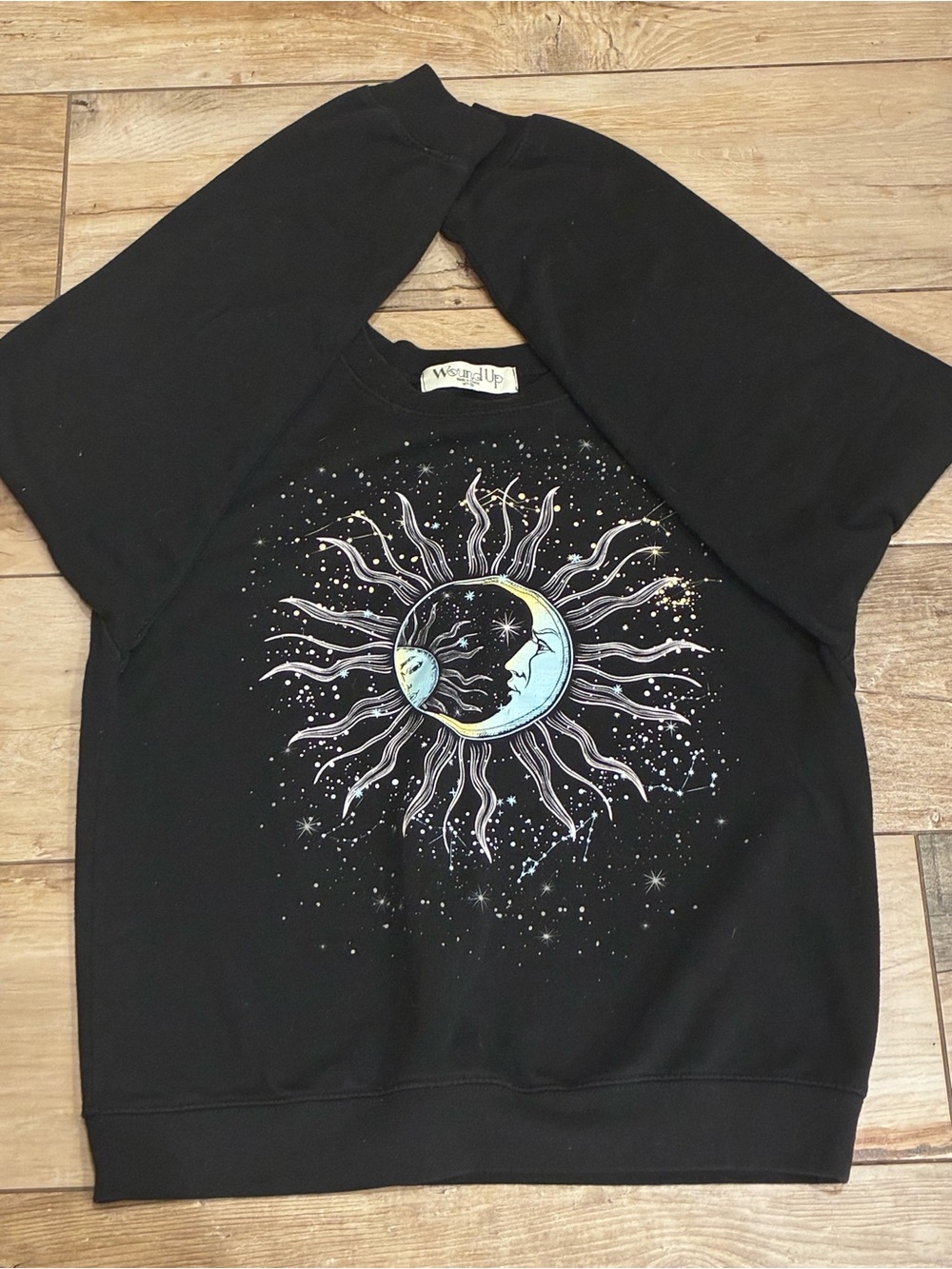 Wound Up Black Sweatshirt with Cosmic Earth Design